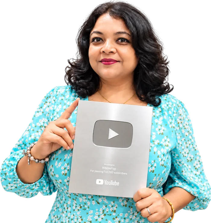 Monami Mukherjee with the YouTube Silver Play Button